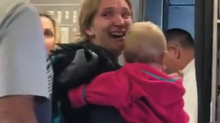 A screenshot from a Facebook video showing the aftermath of a dispute on an American Airlines flight in which an employee allegedly hit a woman with her stroller. (SURAIN ADYANTHAYA/ FACEBOOK)