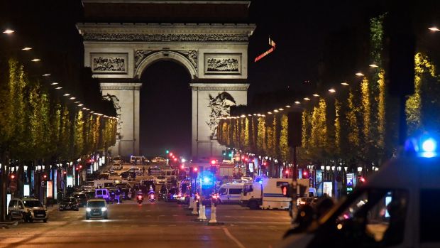 Police have sealed off the Champs Elysees after a shooting.