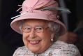 Queen Elizabeth II smiles as she attends an event at Newbury Racecourse in Newbury, England, on her birthday.