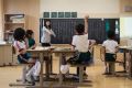 A class of elementary school students in Naraha. Families' reluctance to return has meant that those who do enjoy much ...