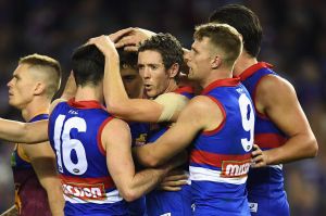 Robert Murphy of the Bulldogs celebrates a goal with team mates.