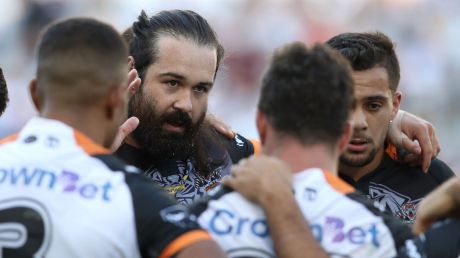 Still focused: Aaron Woods addresses the Tigers in a team huddle.