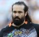 Team man: Aaron Woods with the Tigers during the ANZAC ceremony at ANZ Stadium.