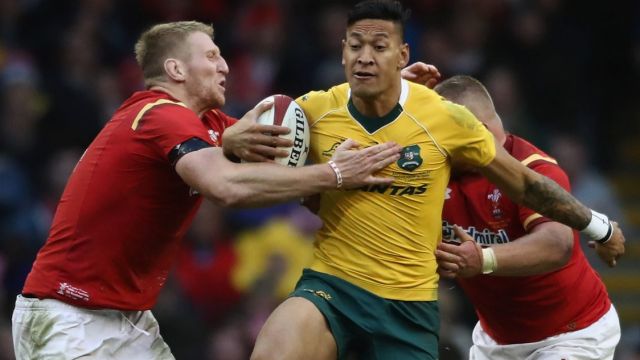 CARDIFF, WALES - NOVEMBER 05: Israel Folau of the Australian Wallabies is held by Bradley Davies during the ...