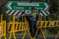 ACT Police conduct road traffic management near the scene of the fatal accident involving a cyclist and a car on the ...