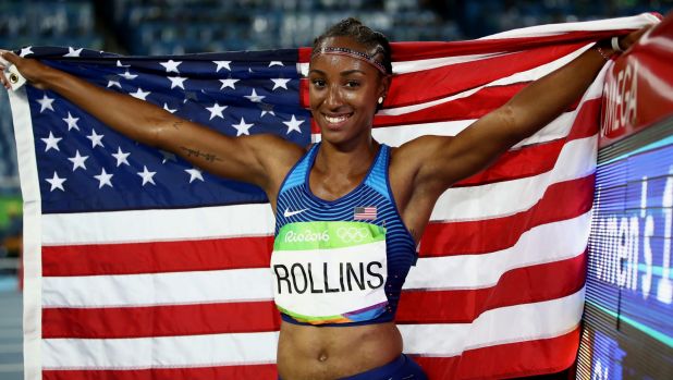 Rollins celebrates after winning the gold medal in the 100 hurdles in Rio.