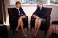 Britain's Prime Minister Theresa May, right, and Scotland's First Minister Nicola Sturgeon sit during their meeting in ...