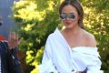 Is it a shirt, is it a dress? Chrissy Teigen absolutely owning this look.