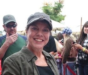 American actress Erin Moran, best known for her turn on the legendary TV series, Happy Days signs autographs on the red carpet at the 62nd Annual Mother Goose Parade in San Diego County.