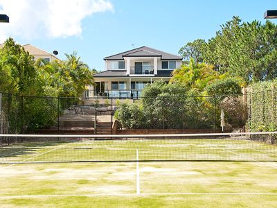 Private full sized tennis court