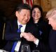 President Donald Trump, right, shakes hands with Chinese President Xi Jinping during a dinner at Mar-a-Lago.