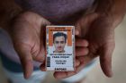 Rohingyan refugee Imran Mohammad Fazal Hoque with his Offshore Processing Centre card, on Manus Island in Papua New ...