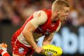 Ball magnet: Sydney's Dan Hannebery may force the Crows to reconsider their no-tagging approach.