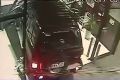 An image of the LandCruiser ramming the doors of the shopping centre.