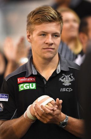 Injured Jordan De Goey: A spectator at the MCG.