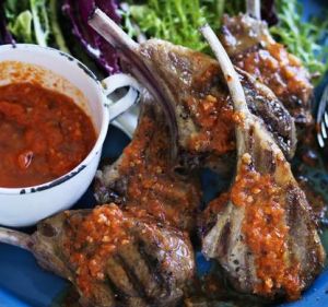 A saucy duo: Grilled lamb with romesco sauce.