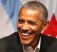 Former President Barack Obama smiles as he hosts a conversation on civic engagement on Monday.