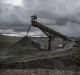 A machine places milled minerals into a pile near the concentration plant at the Ferrobamba pit, one of the three pits ...