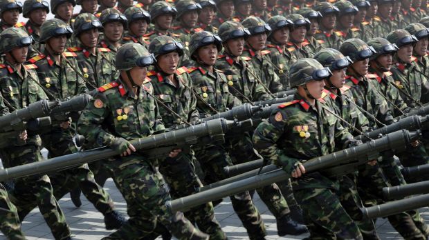 North Korean soldiers carrying rockets march during a military parade to celebrate the 105th birth anniversary of Kim ...