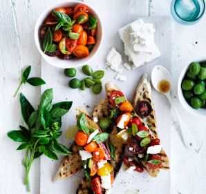 Neil Perry's bruschetta with cherry tomatoes, basil, olives and feta.