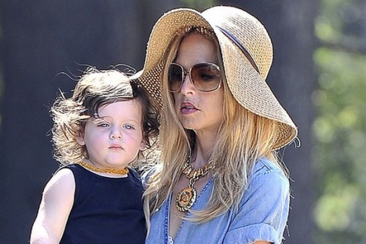 Amber teething necklaces are popular with many parents, including stylist Rachel Zoe and her son Skyler, shown here, but ...