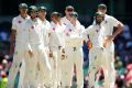 Where's the cash? Australian players wait for a DRS decision . Getty 