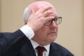 Attorney-General George Brandis has cast doubt on the future of the merged LNP.