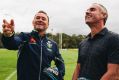 Raiders coach Ricky Stuart checks the wind with Matt Millar, who is holding a charity golf day over the weekend to raise ...