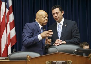 Rep. Jason Chaffetz, R-Utah, chairman of the House Oversight and Government Reform Committee, right, confers with Rep. Elijah Cummings, D-Md., the ranking member, left, just before the start of a hearing with FBI Director James Comey who was called to explain the agency's recommendation to not prosecute Hillary Clinton, now the Democratic presidential candidate, over her private email setup, on Capitol Hill in Washington, Thursday, July 7, 2016.