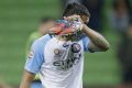 Tim Cahill heads off after Melbourne City lost to Perth Glory.