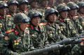 North Korean soldiers carrying rockets march during a military parade to celebrate the 105th birth anniversary of Kim ...