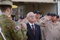 Malcolm Turnbull with Australian troops at Australia's main base in the Middle East..