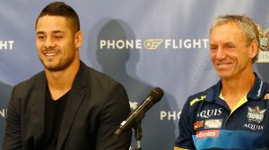 Happier days: Jarryd Hayne with Gold Coast coach Neil Henry after he signed with the Titans last season.