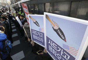 South Korean protesters stage a rally to oppose a plan to deploy an advanced U.S. missile defense system called Terminal High-Altitude Area Defense, or THAAD, in front of the Defense Ministry in Seoul, South Korea, Tuesday, Feb. 28, 2017.