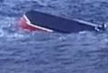 A boat has overturned near North Stradbroke Island with 11 people onboard.