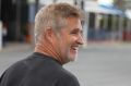 Geoff McBaron arrives back on dry land after the boat he was on overturned while crossing the South Passage Bar between ...