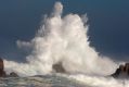 Large waves break off the shoreline Wednesday, Nov. 9, 2016, in Pacific Grove, Calif. A weather front from the Gulf of ...