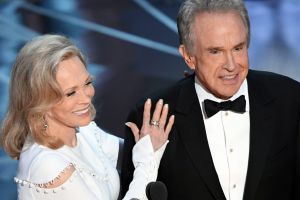 'I thought he was joking': Faye Dunaway, left, and Warren Beatty before announcing the Oscar for best picture.