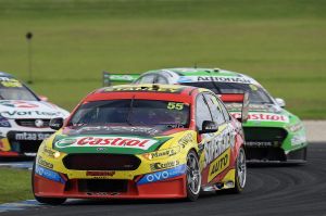 Chaz Mostert ahead of Mark Winterbottom during race 6 for the Phillip Island 500.