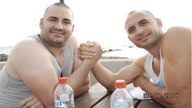 Aniello Vinciguerra and George Nika pose for a photograph during a rest stop in South Australia in November, 2014.