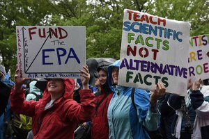 People participate in the March for Science in Washington, Saturday, April 22, 2017.