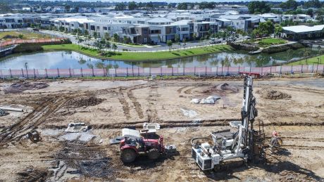 Fairwater is a new geo-thermal cooled mini-suburb in Blacktown. The drilling rig (foreground) drills down 50-120m as the ...