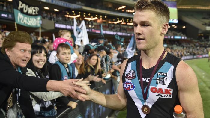 Robbie Gray of the Power celebrates with fans during the Round 5 AFL match between the Port Adelaide Power and the Carlton Blues at Adelaide Oval in Adelaide, Friday, April 21, 2017. (AAP Image/David Mariuz) NO ARCHIVING, EDITORIAL USE ONLY