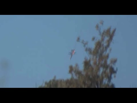 NEW VIDEO: Russian Su-24 fighter jet downed over Syria, parachute seen in sky