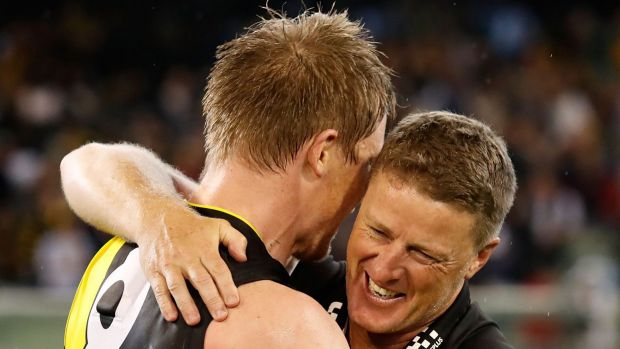 MELBOURNE, AUSTRALIA - APRIL 24: Damien Hardwick, Senior Coach of the Tigers celebrates with Jack Riewoldt of the Tigers during the 2017 AFL round 05 match between the Richmond Tigers and the Melbourne Demons at the Melbourne Cricket Ground on April 24, 2017 in Melbourne, Australia. (Photo by Adam Trafford/AFL Media/Getty Images)