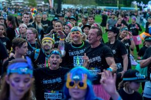 Enthusiastic participants in The Color Run Night at Flemington Racecourse in Melbourne tonight.