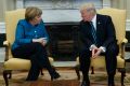 President Donald Trump meets with German Chancellor Angela Merkel in the Oval Office of the White House in Washington, ...