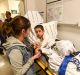 Thousands of patients, including Rayann Zamani with mother Palli, inundated hospitals across Melbourne due to the ...