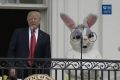 First Lady Melania Trump, US President Donald Trump and the Easter Bunny attend the 2017 White House Easter Egg Roll.