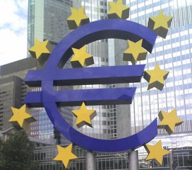 File - A sculpture of the symbol of the Euro is seen in front of the European Central Bank in Frankfurt, Germany.